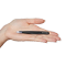 Tweezers lieing down on an open palm